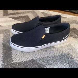 Black Nike Slip-Ons